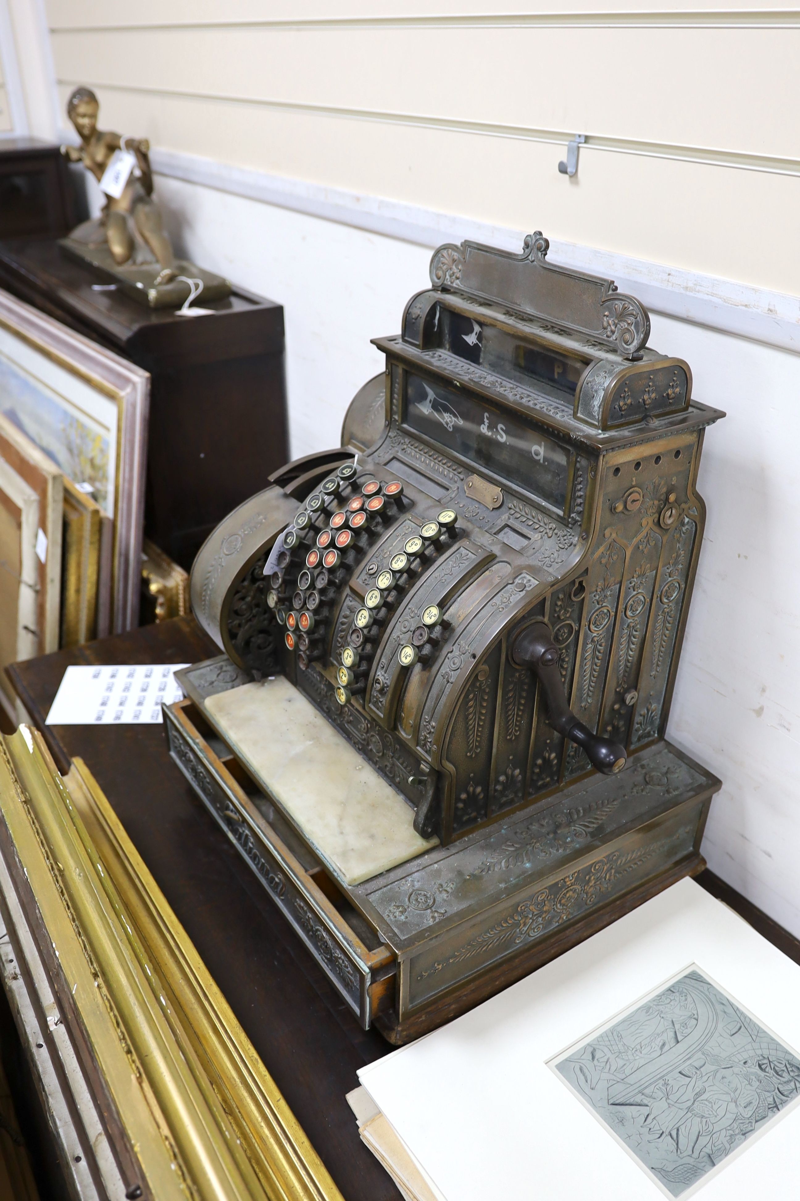 An early 20th century American National cash register, Serial Number 1068452/484, width 47cm, depth 39cm, height 57cm